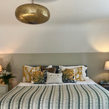 Bedroom full of decorative colour & texture