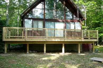 Deck - large traditional backyard deck idea in Boston with no cover