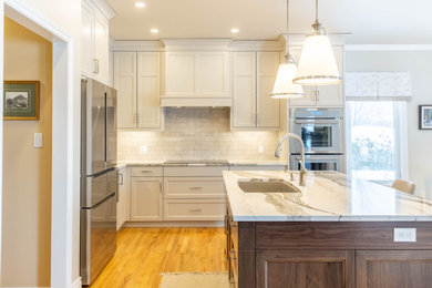 Example of a mid-sized classic l-shaped light wood floor and beige floor open concept kitchen design in Ottawa with a single-bowl sink, recessed-panel cabinets, white cabinets, quartz countertops, white backsplash, porcelain backsplash, stainless steel appliances, an island and white countertops