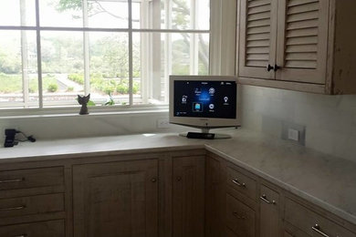Photo of a mid-sized transitional kitchen in Other with shaker cabinets, light wood cabinets, marble benchtops, grey splashback and subway tile splashback.