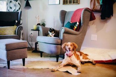 Example of a large urban concrete floor home studio design in Atlanta with white walls