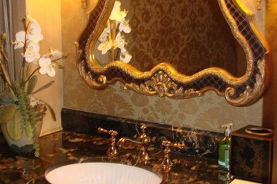 Example of a bathroom design in Other with granite countertops