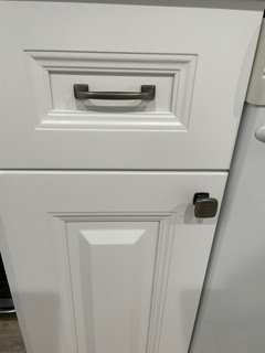 white cabinets with brass pulls