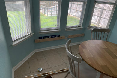 Example of an arts and crafts dining room design in Austin