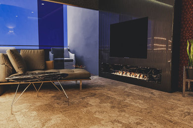Example of a large minimalist master carpeted, beige floor and wallpaper bedroom design in Other with gray walls and a ribbon fireplace
