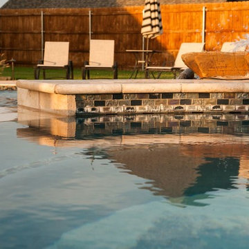 glass tile with travertine coping