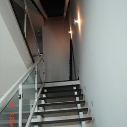 Steel stairs with glass panel - Products