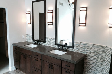 Example of a mountain style home design design in Denver