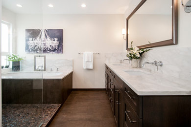 Design ideas for a large transitional master bathroom in Seattle with shaker cabinets, dark wood cabinets, an undermount tub, an open shower, multi-coloured tile, pebble tile, white walls, porcelain floors, an undermount sink and marble benchtops.