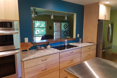 Small trendy galley eat-in kitchen photo in Other with an island