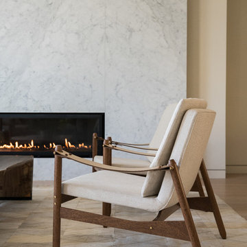 Contemporary Living Room Close-Up with Marble Fireplace and Textured Accents