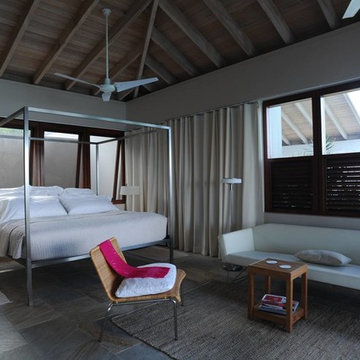 Curtain tracks with floor to ceiling curtains around guest suites in Caribbean