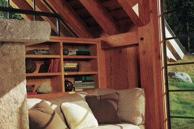 Study room - mid-sized rustic medium tone wood floor study room idea in San Francisco with brown walls