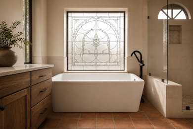 Example of a mid-sized classic master white tile and porcelain tile terra-cotta tile, multicolored floor and double-sink bathroom design in Phoenix with shaker cabinets, medium tone wood cabinets, a two-piece toilet, white walls, an undermount sink, quartz countertops, a hinged shower door, white countertops and a built-in vanity
