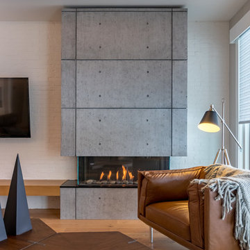 3-Sided Fireplace with Concrete Feature Wall | Fonthill, ON