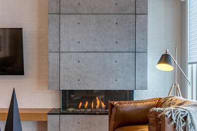 3-Sided Fireplace with Concrete Feature Wall | Fonthill, ON