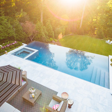 Luxury vanishing edge swimming pool and outdoor living area Ridgewood NJ