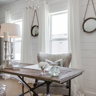 Inspiration for a small vintage home office and library in Dallas with white walls, carpet and a freestanding desk.