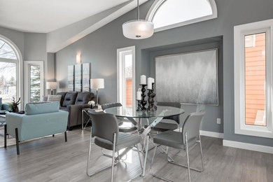 Inspiration for a modern dining room remodel in Calgary