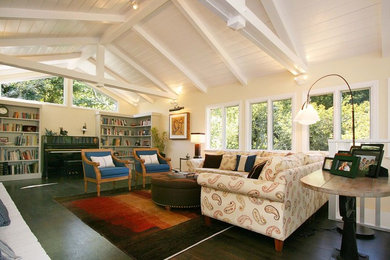 Family room - mid-sized open concept dark wood floor and brown floor family room idea in San Francisco with white walls