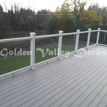 high level azek deck with glass railing
