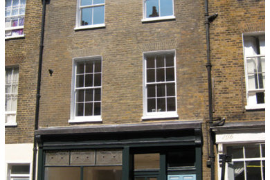 Traditional terraced house in London with three floors.