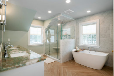 Large transitional white tile and stone slab porcelain tile, brown floor and double-sink bathroom photo in Cleveland with beaded inset cabinets, white cabinets, white walls, an undermount sink, quartzite countertops, green countertops and a built-in vanity
