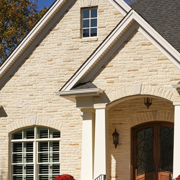 Spalding Tudor Brick Home featuring Sugarcane Brown Stone - South Carolina