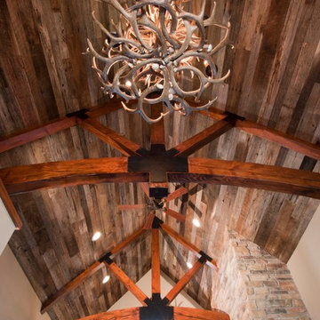 Reclaimed Wood Ceiling Paneling and Timber Beams in a Rustic Lodge Great Room