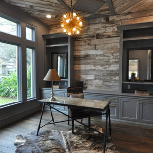 Photo of a medium sized rustic study in Houston with grey walls, dark hardwood flooring, no fireplace, a freestanding desk and brown floors.