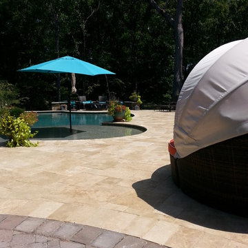 Backyard patio, pool, and fire pit.