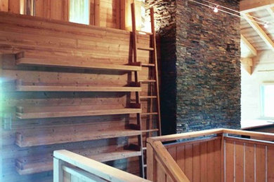 Example of a mountain style staircase design in Other