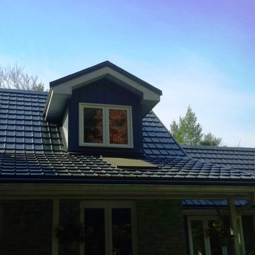 Houses with Hy-Grade's permanent steel roofing "cure"