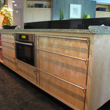 Contemporary kitchen on Philadelphia's Main Line in bird's eye maple