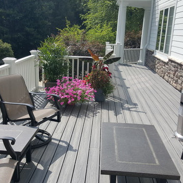 Estate Home with Covered Porch and Water Diversion System for Dry Space Below