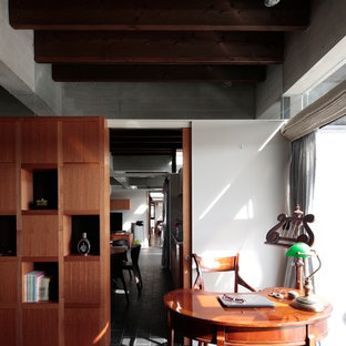 Inspiration for a modern study in Other with white walls, slate flooring, no fireplace and a freestanding desk.