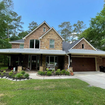 Custom Exterior Renovation with Roofing & Metal Details