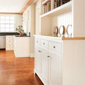 Buffet cabinet with maple counter hides the trash and recycling