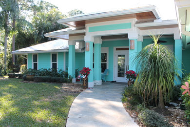 Island style exterior home photo in Miami