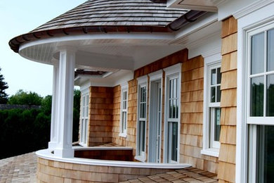 Example of a large classic exterior home design in New York