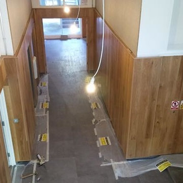 Installing Wall Cladding and Concrete Floor Tiles in Hide Tower