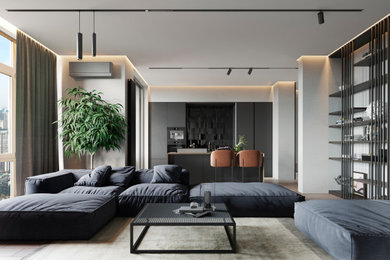 This is an example of a large contemporary open plan living room in London.