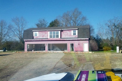 Example of a trendy home design design in Atlanta