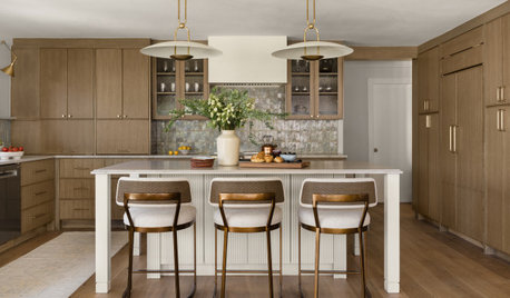 Kitchen Opens Up to a Sunroom for Casual Entertaining