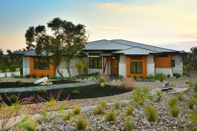 Inspiration for a mid-sized contemporary exterior home remodel in Austin