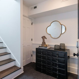 Photo of a traditional basement in Los Angeles with black floors.