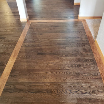 Hardwood Elegance with Custom Inlays & Entry Border