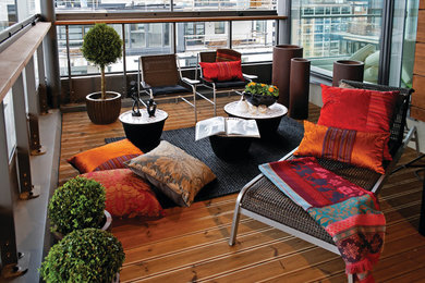Balcony - contemporary balcony idea in Toronto with a roof extension
