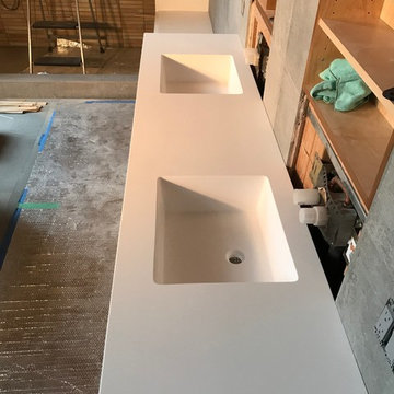 Master Bath in modern seamless corian solid surface