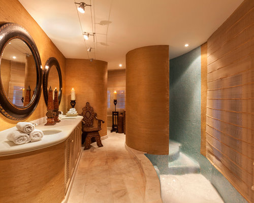 Bäder mit Kalkstein-Waschbecken/Waschtisch und verzierten Schränken